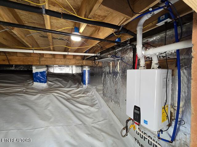 interior space featuring tankless water heater