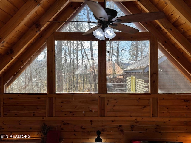 interior space featuring ceiling fan