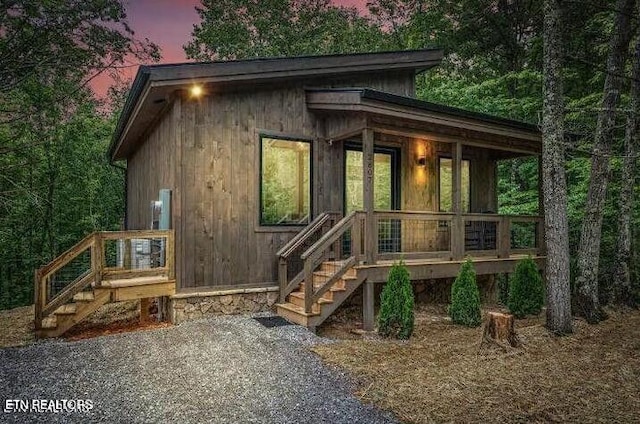 exterior space featuring a sunroom