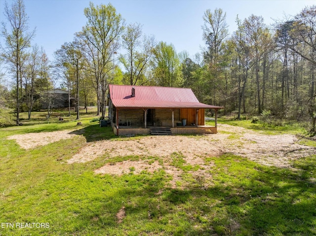 346 Chestuee Rd, Calhoun, TN 37309 - view of front of home with metal roof, a front lawn, and covered porch