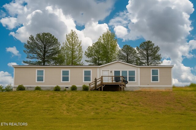 6960 Cottonport Rd, Decatur, TN 37322 - back of property featuring a wooden deck, a lawn, and crawl space