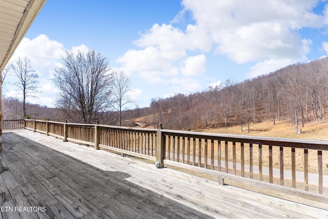 deck with a view of trees