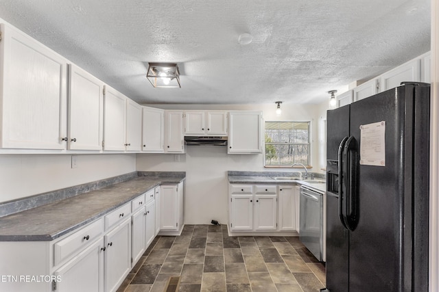 kitchen featuring white cabinets, a sink, stainless steel dishwasher, and black fridge