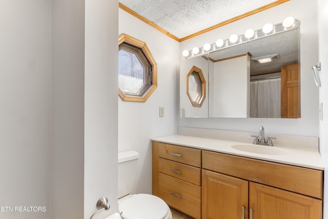 full bathroom featuring toilet, visible vents, a textured ceiling, and vanity
