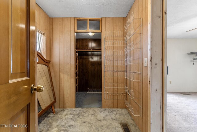 spacious closet featuring carpet and visible vents