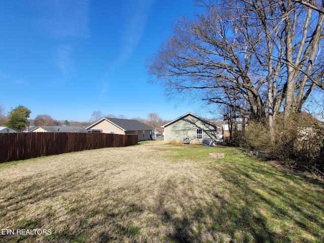 view of yard with fence