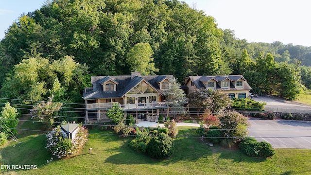 exterior space with a forest view