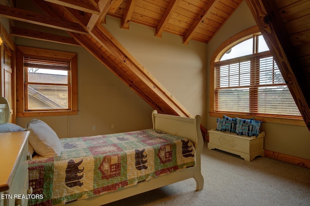 carpeted bedroom with lofted ceiling with beams and wood ceiling