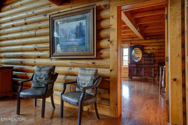 sitting room featuring wood finished floors