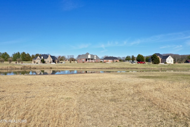 view of yard with a water view