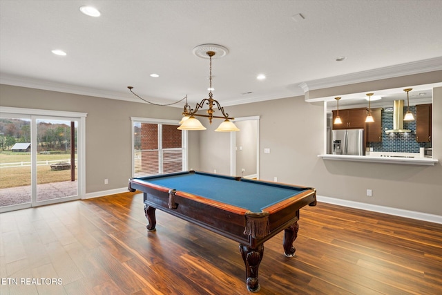 rec room featuring crown molding, baseboards, wood finished floors, and recessed lighting