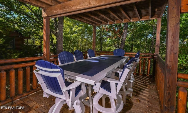 wooden deck with outdoor dining area