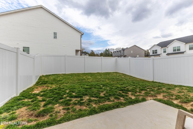 view of yard featuring a fenced backyard