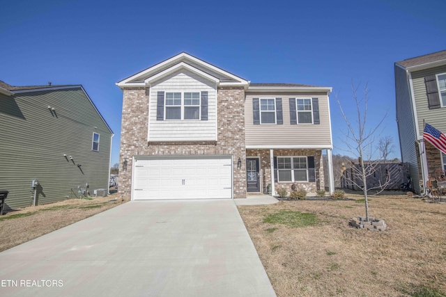 craftsman-style home featuring an attached garage, concrete driveway, and brick siding