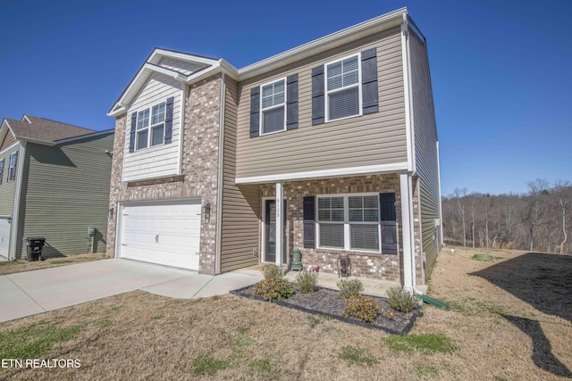 view of front of property with a garage, brick siding, and driveway