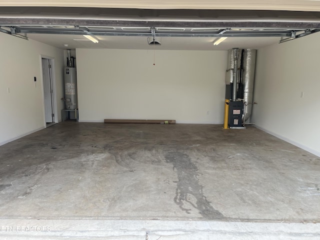 garage with heating unit and water heater