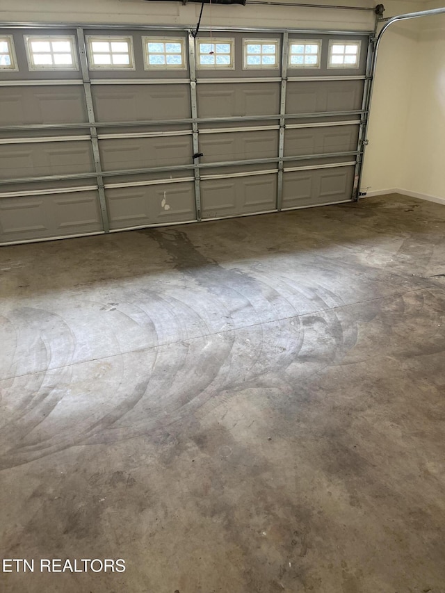 garage featuring baseboards