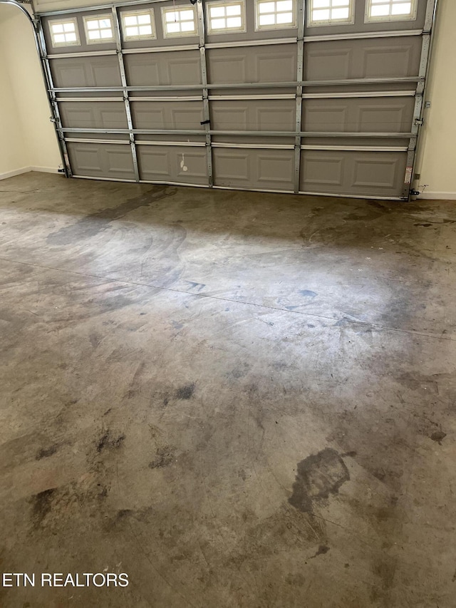 garage with baseboards