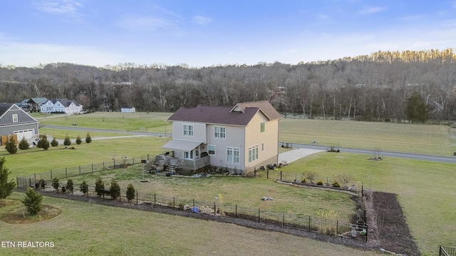 drone / aerial view with a rural view and a forest view