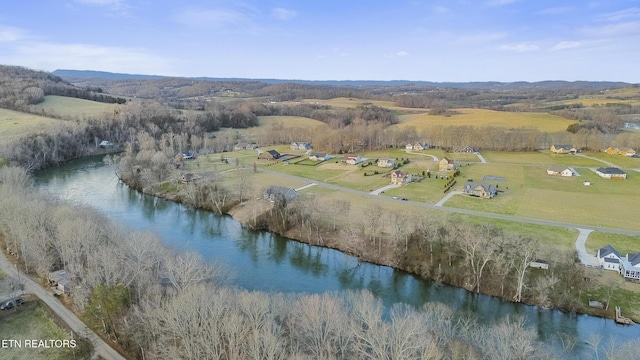 drone / aerial view featuring a water view