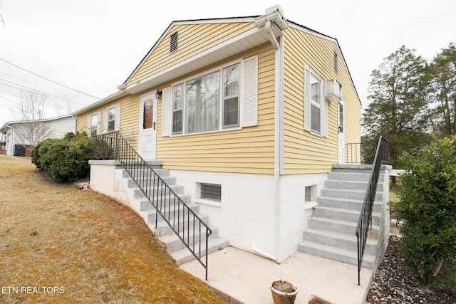 view of property exterior featuring a yard