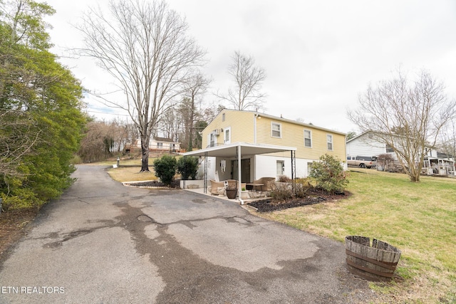 exterior space with a yard