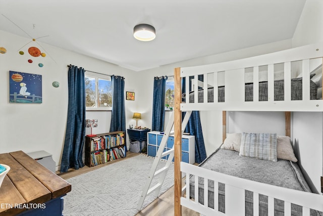 bedroom featuring wood finished floors