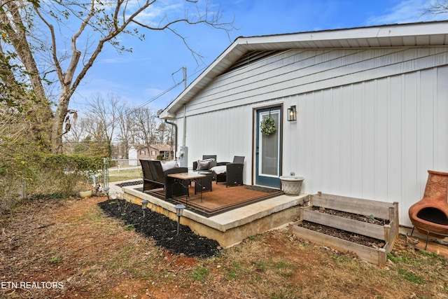 wooden deck with a gate and fence