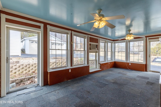 unfurnished sunroom with cooling unit