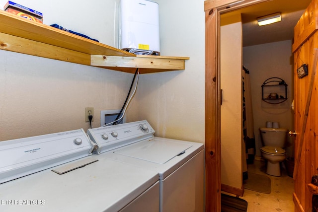 laundry room featuring laundry area and washing machine and dryer