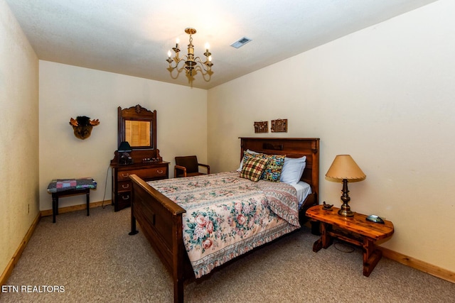 carpeted bedroom with baseboards, visible vents, and an inviting chandelier