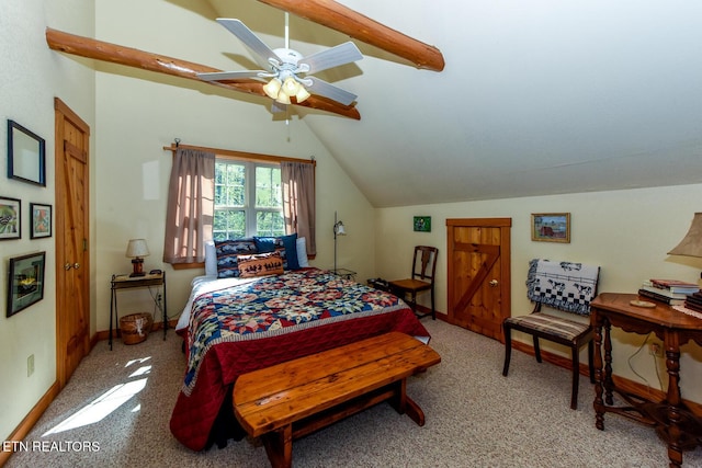 carpeted bedroom featuring vaulted ceiling, baseboards, and ceiling fan