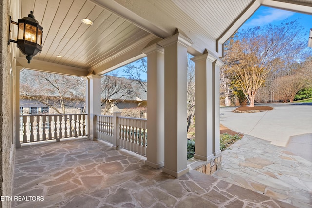 view of patio featuring a porch