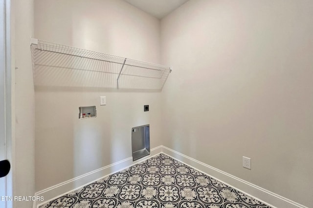 washroom featuring laundry area, hookup for a washing machine, electric dryer hookup, and baseboards