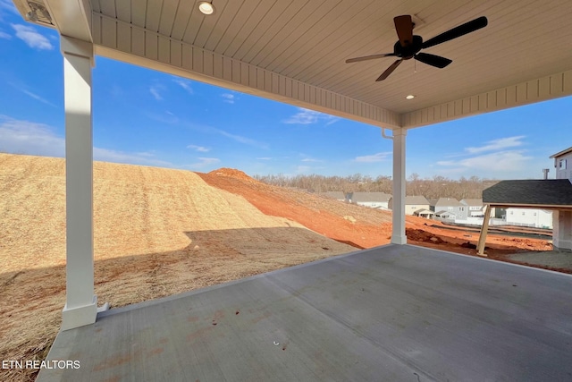 view of patio featuring ceiling fan