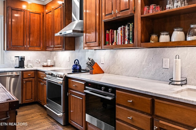 kitchen with open shelves, decorative backsplash, appliances with stainless steel finishes, and wall chimney range hood