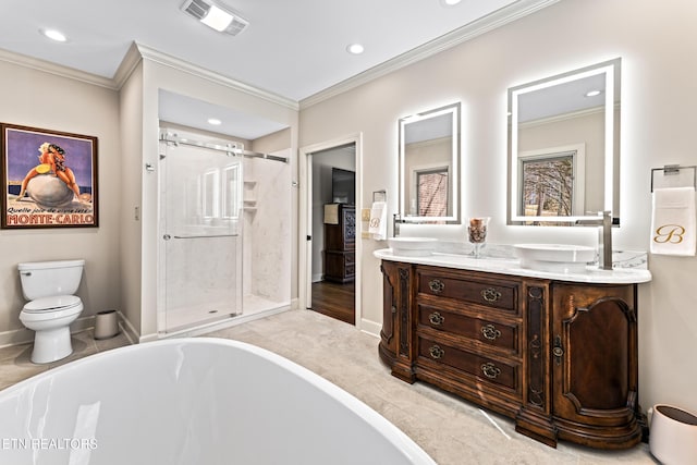 bathroom with a soaking tub, crown molding, and visible vents