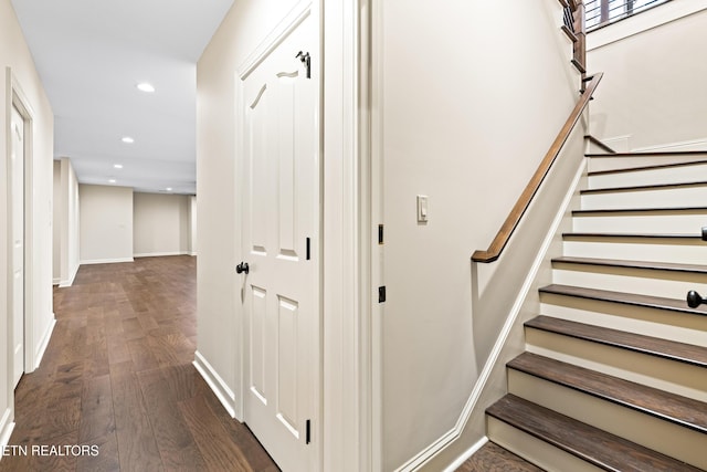 stairs featuring recessed lighting, baseboards, and wood finished floors