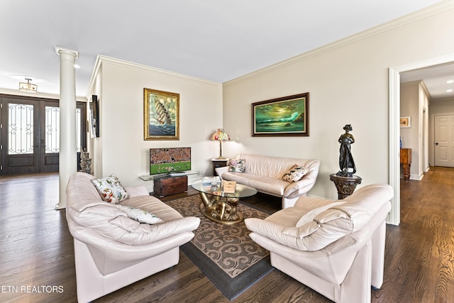 living room featuring french doors, wood finished floors, crown molding, and ornate columns