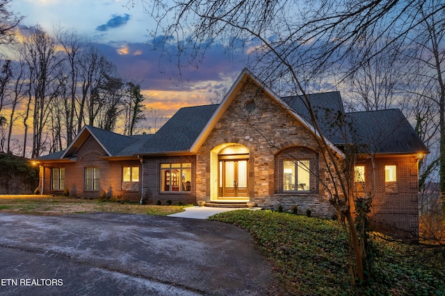 view of front of property featuring brick siding