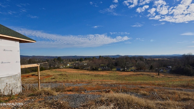 view of mountain feature with a rural view