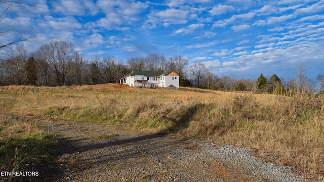 view of street featuring driveway