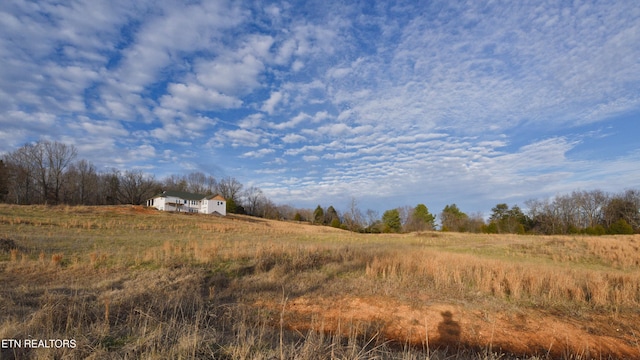 view of landscape with a rural view