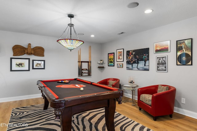 game room featuring recessed lighting, wood finished floors, visible vents, and baseboards