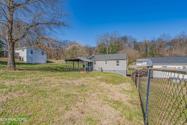 view of yard with a fenced backyard
