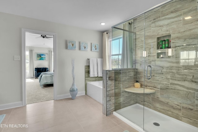 ensuite bathroom with a stall shower, connected bathroom, tile patterned flooring, baseboards, and a bath