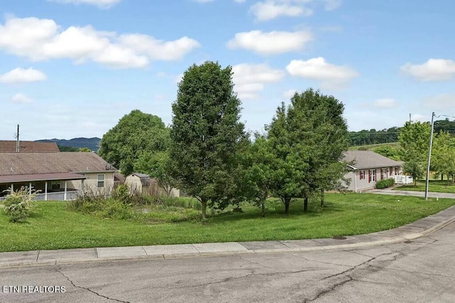 exterior space featuring a front lawn