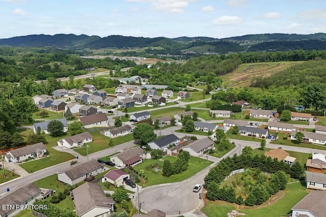 drone / aerial view with a mountain view and a residential view