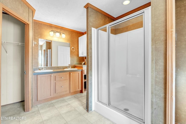 902 Oak Village Ct, Dandridge, TN 37725 - full bath with double vanity, a stall shower, ornamental molding, and a sink