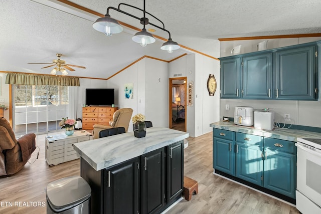 kitchen featuring open floor plan, light countertops, light wood finished floors, and white range with electric cooktop